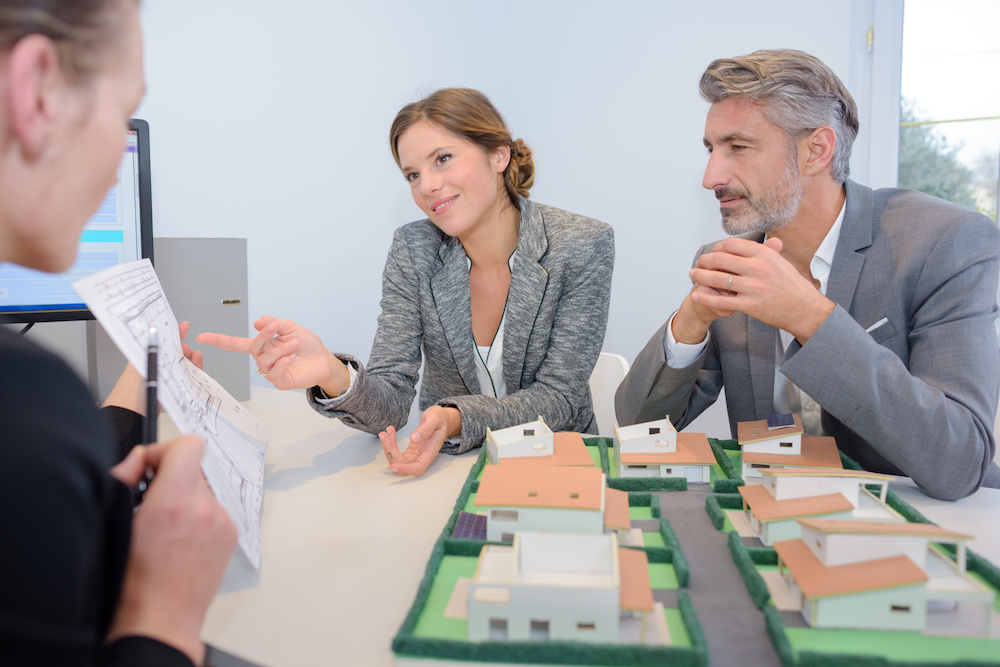 property managers reviewing documents with an expert witness